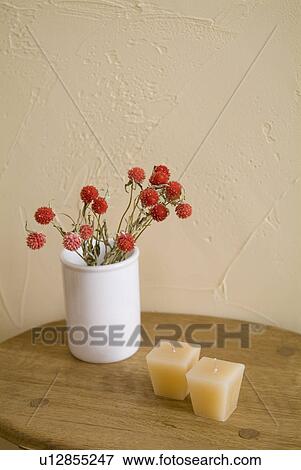 Dried flowers and candles View Large Photo Image Stock Photo - Dried flowers and candles. Fotosearch