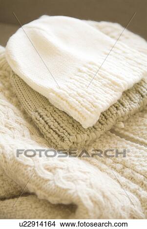 Picture - Knit hats and sweater. Fotosearch