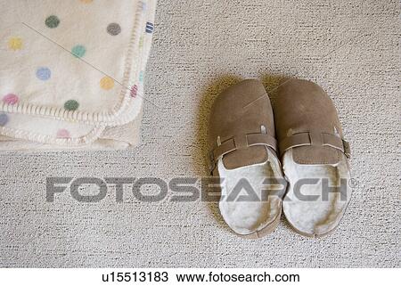 Slippers and blanket View Large Photo Image Stock Image - Slippers and blanket. Fotosearch