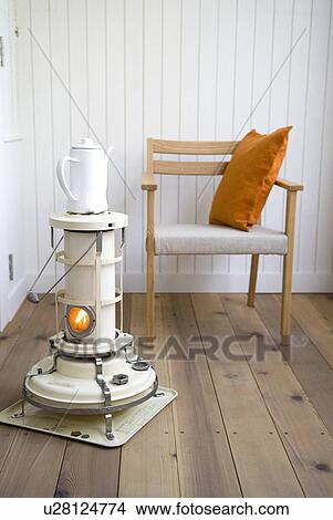 Stove and chair View Large Photo Image Picture - Stove and chair. Fotosearch