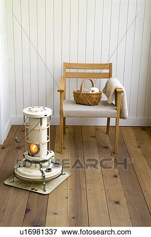 Stove and chair View Large Photo Image Stock Photo - Stove and chair. Fotosearch