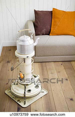 Stock Photo - Stove and sofa. Fotosearch