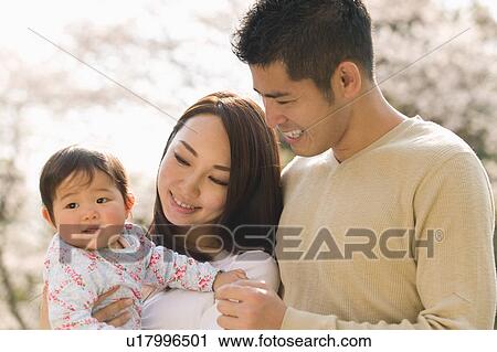 Family with baby View Large Photo Image Stock Image - Family with baby. Fotosearch