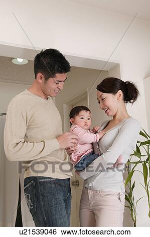 Family with baby View Large Photo Image Stock Photograph - Family with baby. Fotosearch