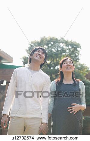 Picture - Pregnant couple. Fotosearch