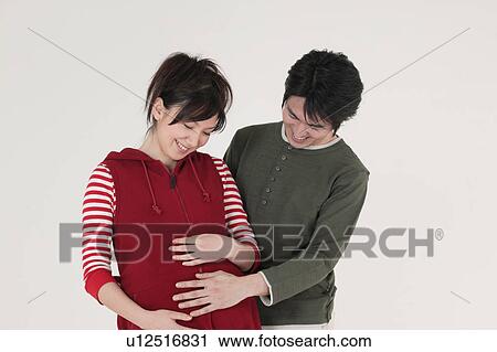 Pregnant couple View Large Photo Image Stock Image - Pregnant couple. Fotosearch