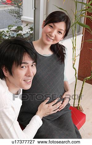 Pregnant couple View Large Photo Image Stock Photo - Pregnant couple. Fotosearch