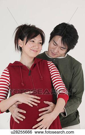 Pregnant couple View Large Photo Image Stock Photograph - Pregnant couple. Fotosearch