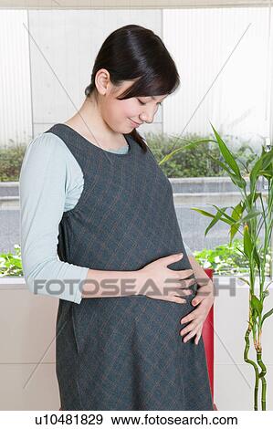 Pregnant woman View Large Photo Image Stock Photo - Pregnant woman. Fotosearch