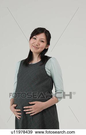Stock Photo - Pregnant woman. Fotosearch
