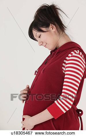 Stock Photo - Pregnant woman. Fotosearch