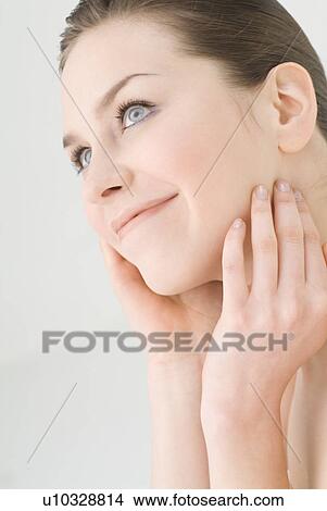 Picture - Young woman smiling. Fotosearch