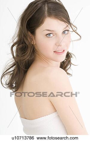 Young woman smiling View Large Photo Image Stock Photograph - Young woman smiling. Fotosearch
