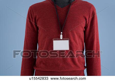 Stock Image - Man wearing ID card. Fotosearch