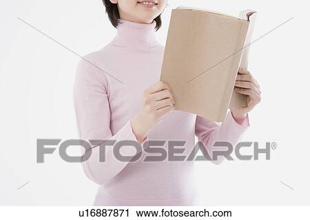 Woman reading book View Large Photo Image Stock Image - Woman reading book. Fotosearch