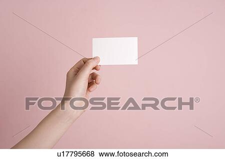 Woman's hand holding card View Large Photo Image Stock Photo - Woman's hand holding card. Fotosearch
