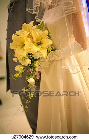 Midsection of bride and groom View Large Photo Image Stock Photo - Midsection of bride and groom. Fotosearch