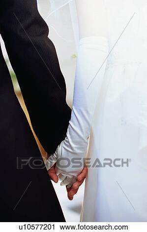 Rear view of bride and groom View Large Photo Image Stock Image - Rear view of bride and groom. Fotosearch
