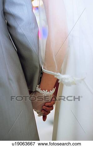 Rear view of bride and groom View Large Photo Image Stock Photo - Rear view of bride and groom. Fotosearch
