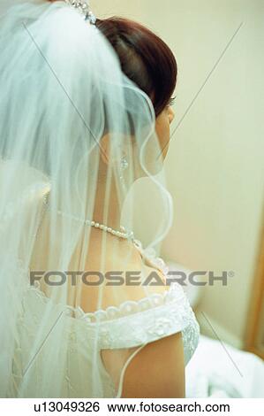 Stock Photograph - Side view of bride. Fotosearch