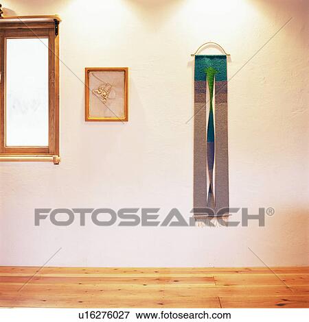 A fabric and a frame hung on wall View Large Photo Image Stock Photo - A fabric and a frame hung on wall. Fotosearch