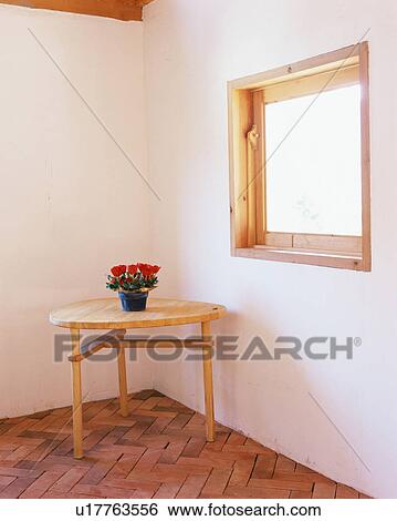 A flower pot on table View Large Photo Image Stock Photograph - A flower pot on table. Fotosearch