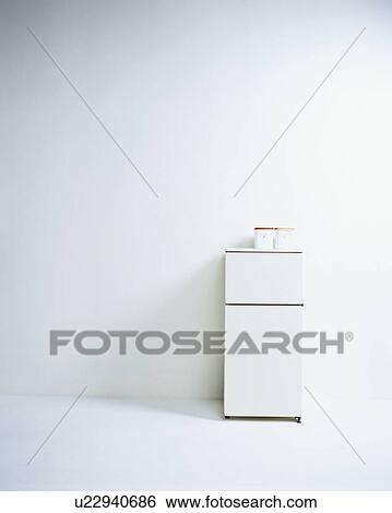 A White refrigerator with two jars View Large Photo Image Stock Photograph - A White refrigerator with two jars. Fotosearch