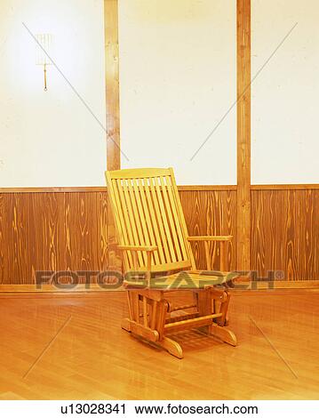 A wooden rocking chair View Large Photo Image Stock Image - A wooden rocking chair. Fotosearch