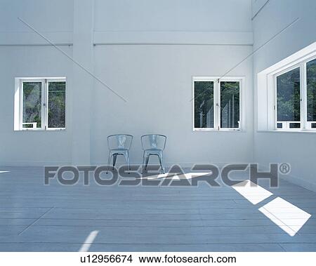Two chairs on floor View Large Photo Image Picture - Two chairs on floor. Fotosearch