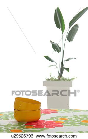 Stock Image - Bowls on a table. Fotosearch