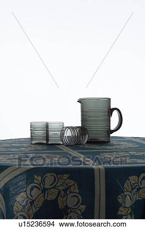 Glass jar on a table View Large Photo Image Picture - Glass jar on a table. Fotosearch