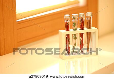 Herbs in tubes View Large Photo Image Stock Photo - Herbs in tubes. Fotosearch