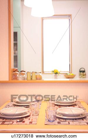Plates set on a table View Large Photo Image Stock Photo - Plates set on a table. Fotosearch