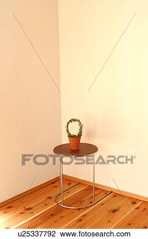 Potted Plant on a stool View Large Photo Image Stock Image - Potted Plant on a stool. Fotosearch