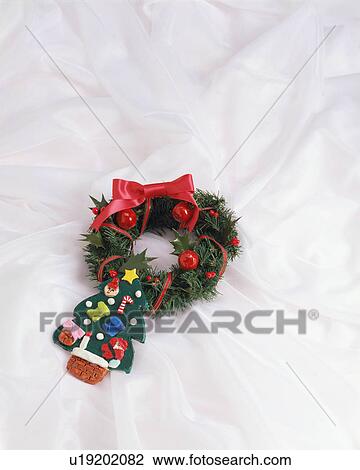 Stock Image - Christmas wreath and tree shaped cookie. Fotosearch