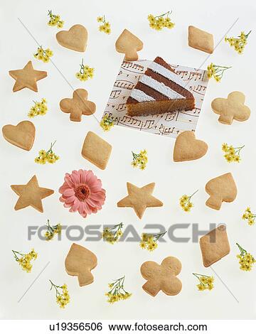 Stock Photograph - Cookies and chocolate cake. Fotosearch