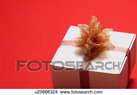 Picture - Gift box with ribbon, close-up. Fotosearch