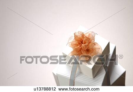 Gift boxes with ribbon, close-up View Large Photo Image Stock Image - Gift boxes with ribbon, close-up. Fotosearch