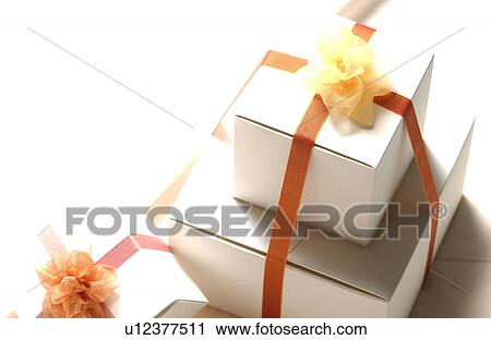 Three gift boxes with ribbon, close-up View Large Photo Image Stock Image - Three gift boxes with ribbon, close-up. Fotosearch