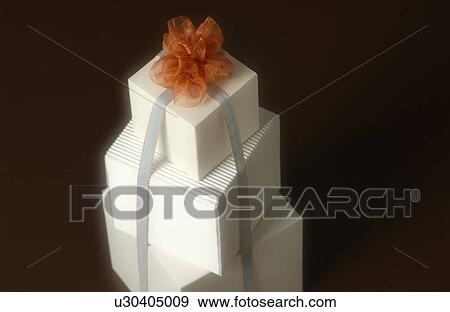 Three gift boxes with ribbon, close-up View Large Photo Image Stock Photo - Three gift boxes with ribbon, close-up. Fotosearch