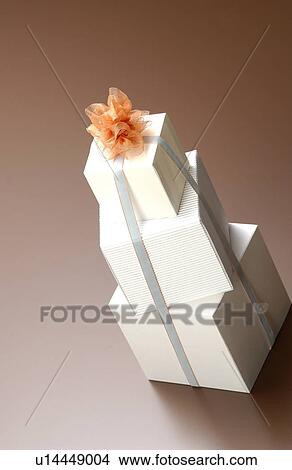 Three gift boxes with ribbon View Large Photo Image Picture - Three gift boxes with ribbon. Fotosearch