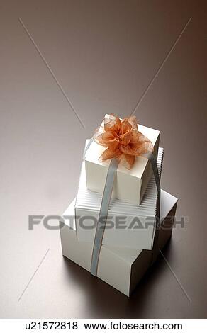 Stock Photo - Three gift boxes with ribbon. Fotosearch