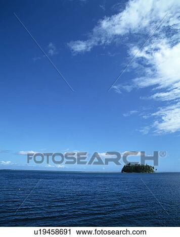 An island amidst ocean View Large Photo Image Stock Image - An island amidst ocean. Fotosearch