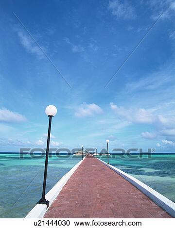 Stock Image - Boardwalk in Maldives. Fotosearch