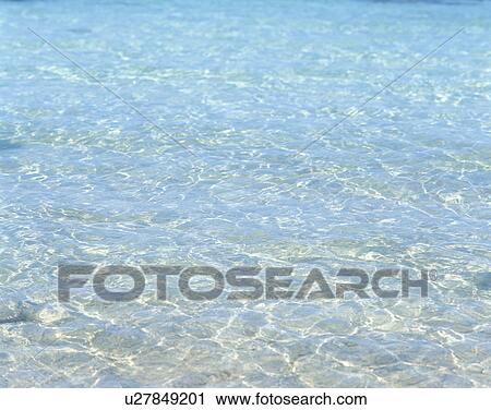 High angle view of waves of sea in Tahiti View Large Photo Image Stock Image - High angle view of waves of sea in Tahiti. Fotosearch