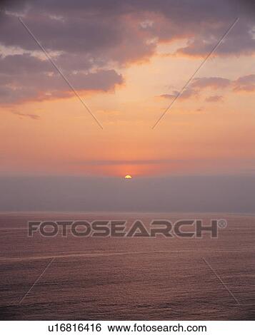 Placid seascape at sunset in Maldives View Large Photo Image Stock Photograph - Placid seascape at sunset in Maldives. Fotosearch