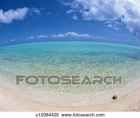 Stock Image - Placid seascape in Tahiti. Fotosearch