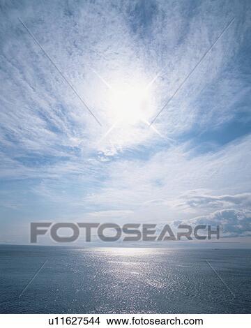 Sunlight reflected on surface of sea View Large Photo Image Picture - Sunlight reflected on surface of sea. Fotosearch