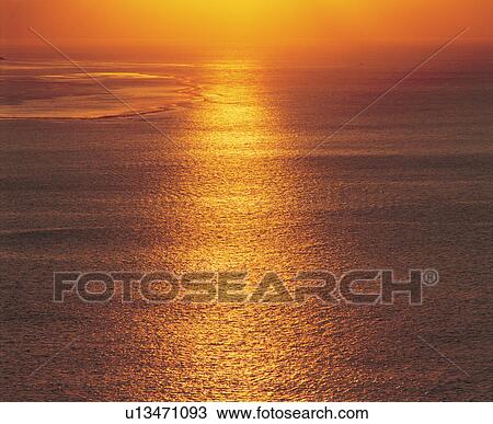 Sunlight reflected on surface of sea View Large Photo Image Stock Image - Sunlight reflected on surface of sea. Fotosearch