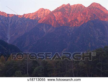Stock Photography - Mt Hodaka at sunset. Fotosearch